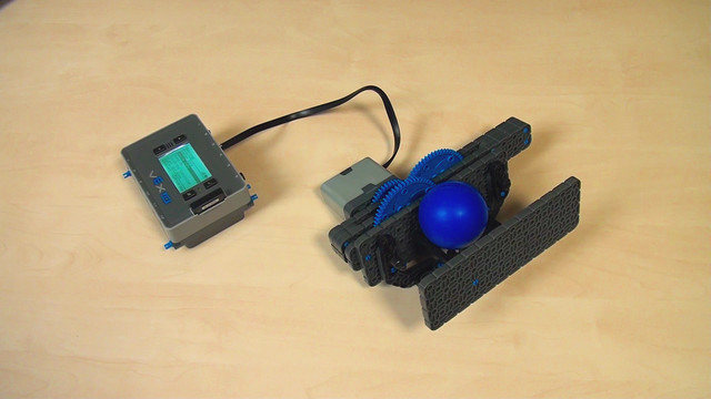 Image for VEX IQ. Throwing a ball by punching it with two levers